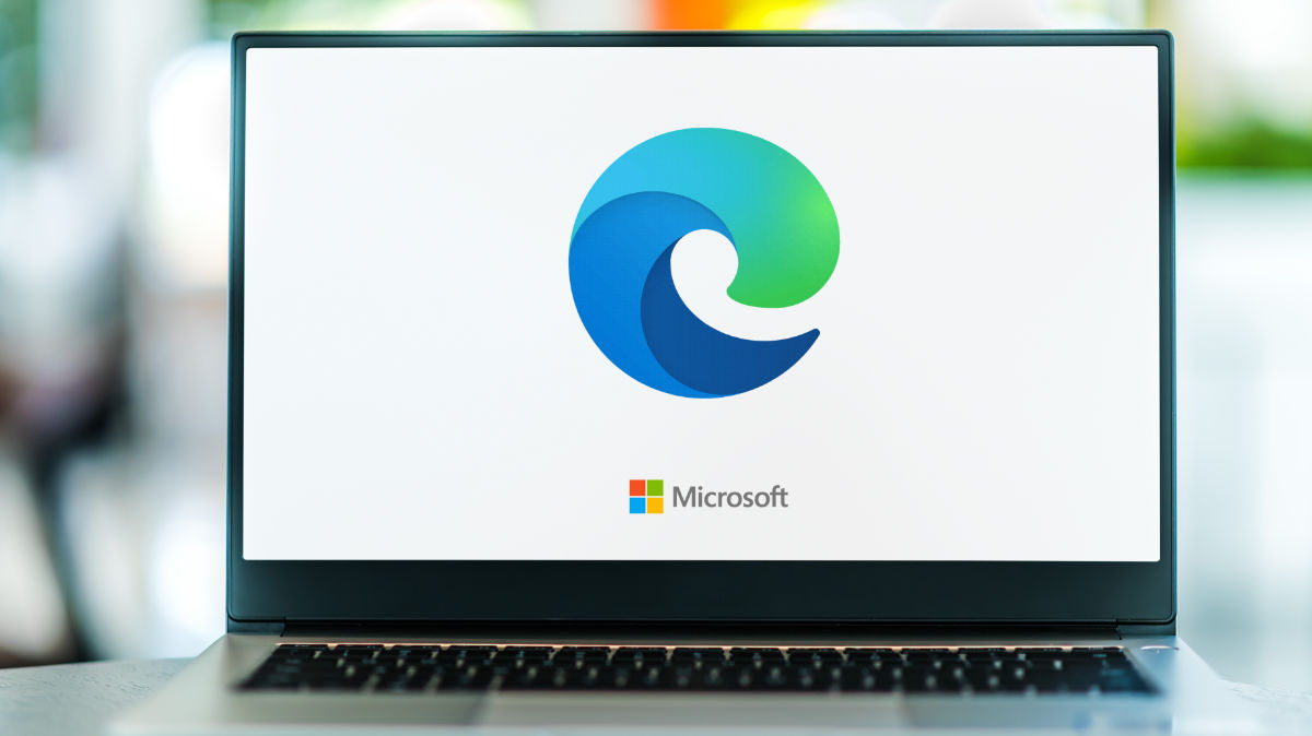 The Microsoft Edge logo displayed on a laptop screen.