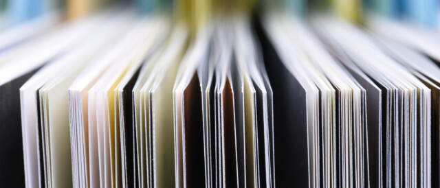 Close-up image of the edges of pages in a magazine