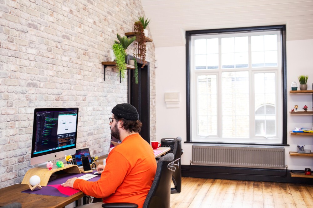 Fever team member working at a computer